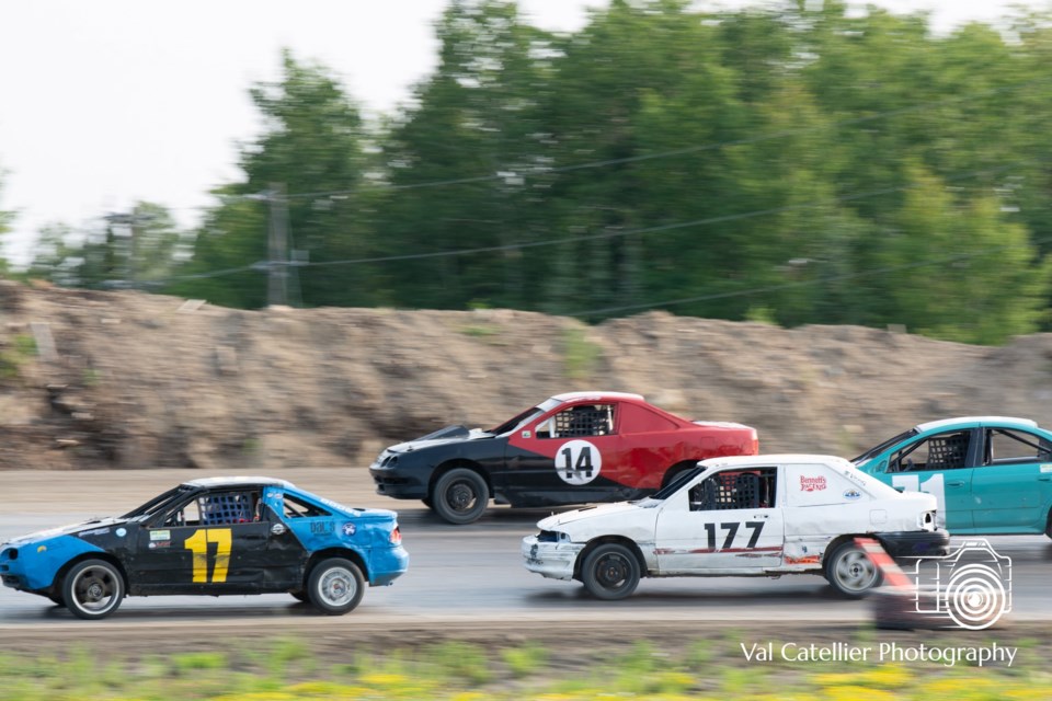 Kamea Mulholland (#17) leads Dustin Alcock (#177), Logan McDonald (#14) and Madoc Mulholland (#71) during a 4 Cylinder heat race at Lake of the Woods Speedway. 