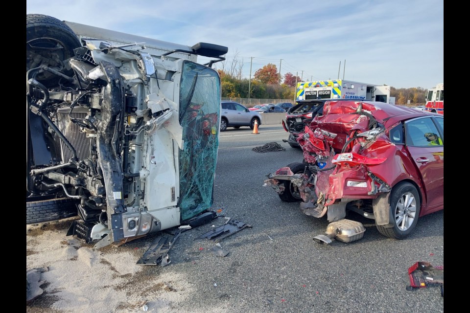 Emergency crews respond to a multi-vehicle collision on the Toronto-bound QEW before Third Line on October 22