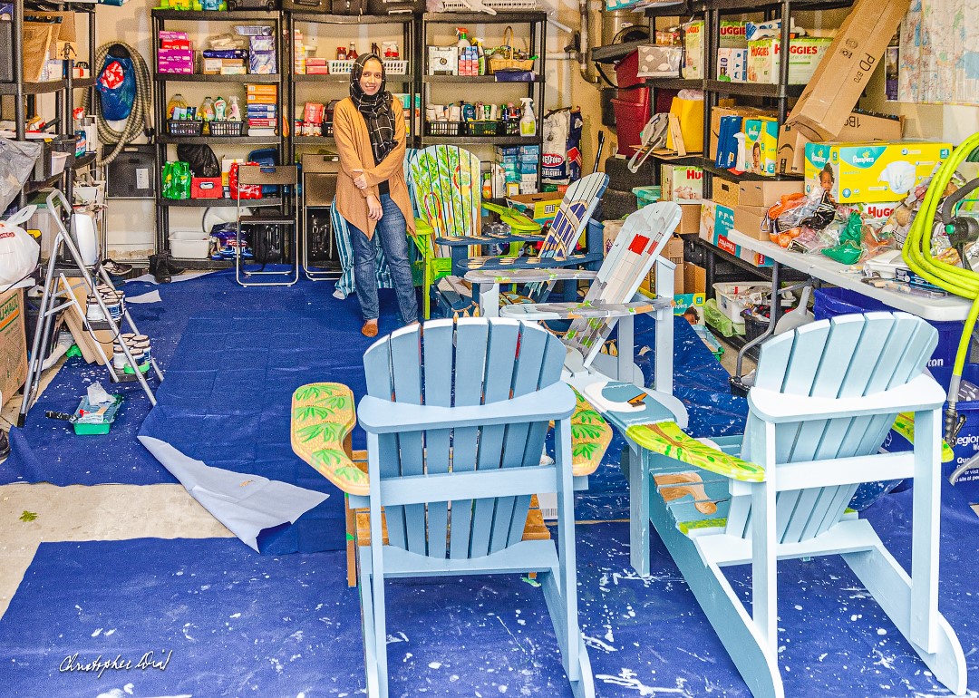 Local artist Rafia Shafiq with her five finished chairs before they were installed throughout the Bronte area. | Stephanie Grella