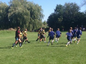 old U12 Oakville Crusaders team in competition |  An older U12 Crusaders team in competition. All competitive and full-contact rugby has been cancelled in light of new regulations put forth by the Ontario government and Rugby Ontario. Image courtesy: Oakville Crusaders