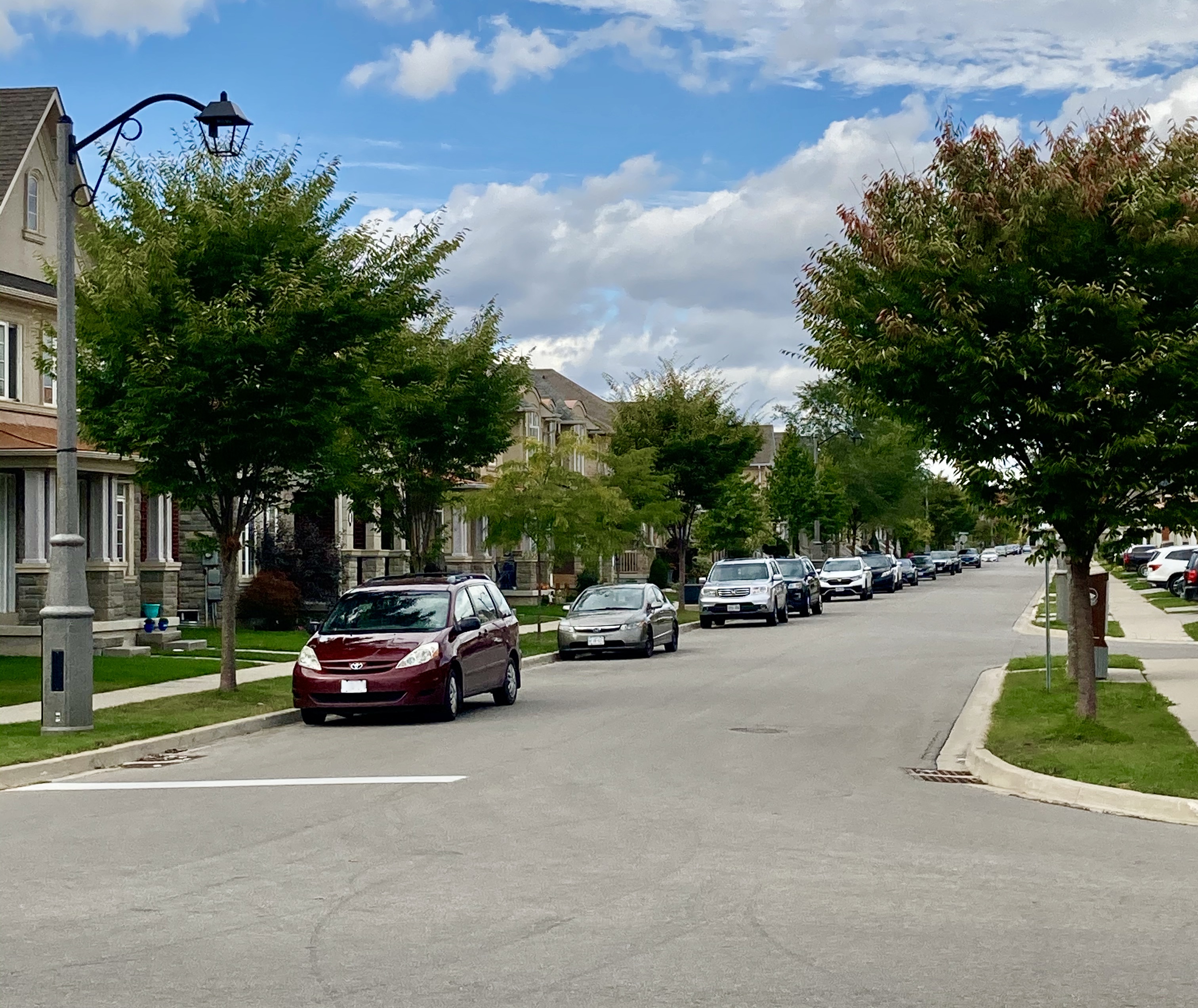 Midday parking is already crowded on street through out North Oakville | Oakville News