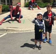 Children having fun with Spiderman at Duran Place. Photo Credit: Geoff Goddard | Geoff Goddard