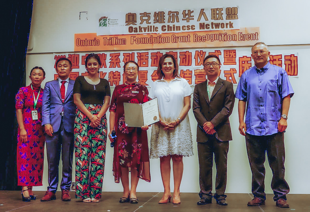 From left to right: Jenny Zeng (OCN Women Club Committee Member), Li  Chen (OCN Board of Director), Pava Parmar (Oakville Ward 7 Regional & Town Councillor), Rena Lu (OCN Founder & President); Effie Triantafilopoulos (MPP for Oakville North-Burlington), Jeff Zhu (OCN Photograph Club Committee Member), Patrick Hu (OCN Board of Directors) | Oakville Chinese Network