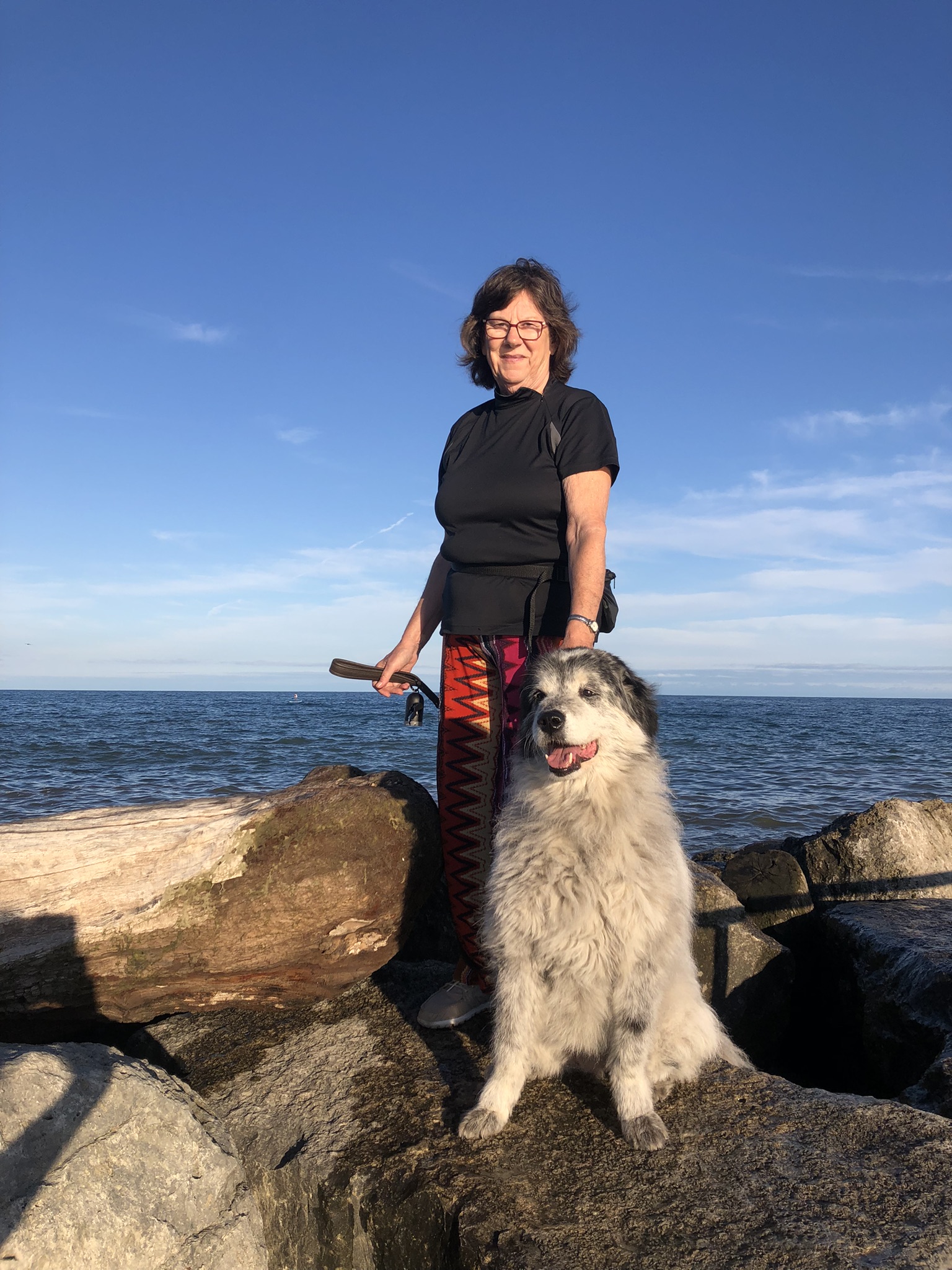 Susan with her dog Sally by Oakville harbour on September 6, 2022 | Wells family