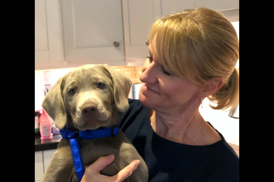 Louise Whiten and her puppy Zack