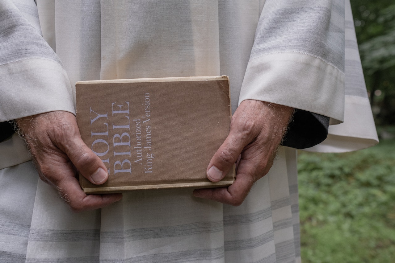 Pastor holding a Bible