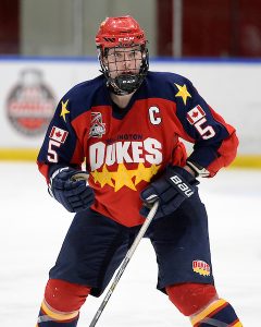  Tim Fallowfield #5 of the Wellington Dukes defends the zone. (Photo by Shawn Muir / OJHL Images)