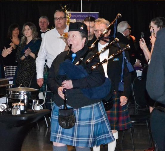 The haggis is piped in at the Rotary Club of Okotoks' Robbie Burns Gala at the Okotoks Centennial Centre on Jan. 28. (Photo courtesy Olivia Landon/Okotoks Rotary)