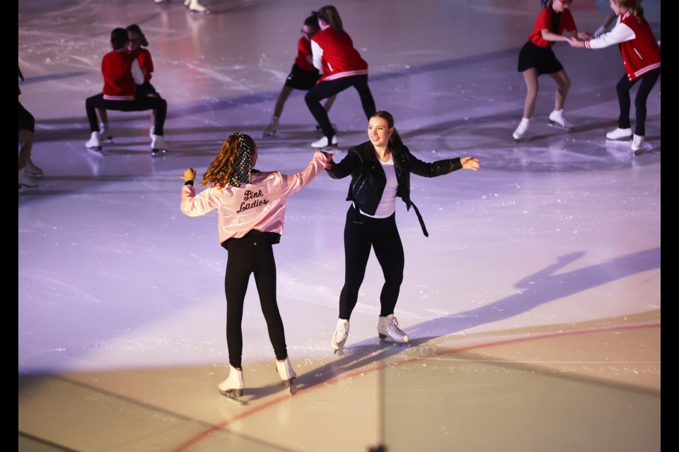 Members of the Okotoks Skating Club perform Grease on Ice at the Murray Arena on March 25.