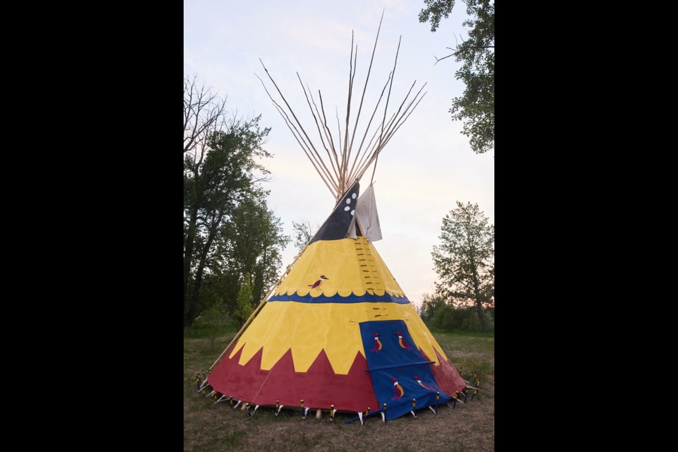 A tipi stands in Laudan Park on June 3 following a ceremony by Elders from First Nations in the Blackfoot Confederacy to transfer it to the Town of Okotoks and Mayor Tanya Thorn.