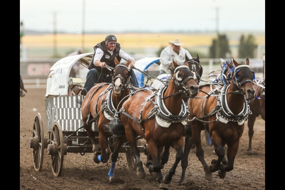 Jason Glass speeds out of the barrels in Heat 9 on Day 4 of the Battle of the Foothills at the High River Ag Society on July 28. 2023.