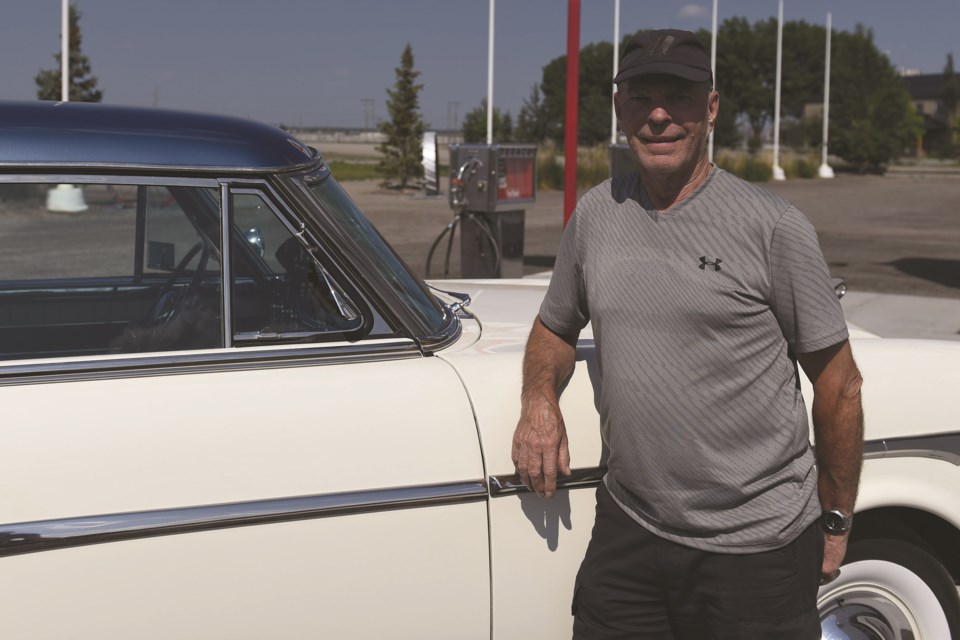 Ray Bouillet, with his 1953 Packard, at Eamon’s Garage near High River. 