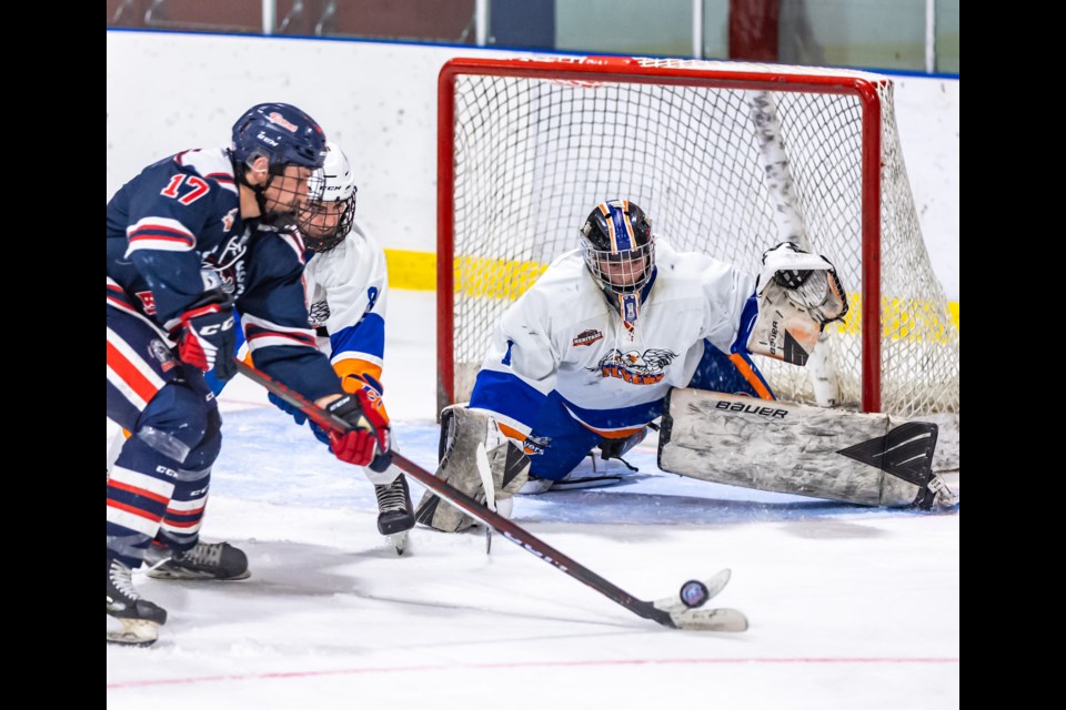 Okotoks Bisons in tough battle in the Hat Saturday night