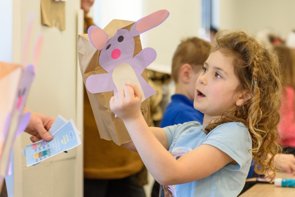 Emily displays the Bob Bilby puppet she made during the Bluey Bash at the Okotoks Public Library on Jan. 4. 