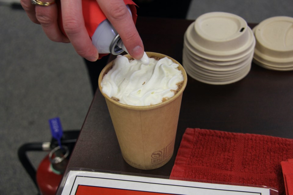 Whipped cream is used as a fire extinguisher for the "Extinguished Chocolate" hot chocolate.