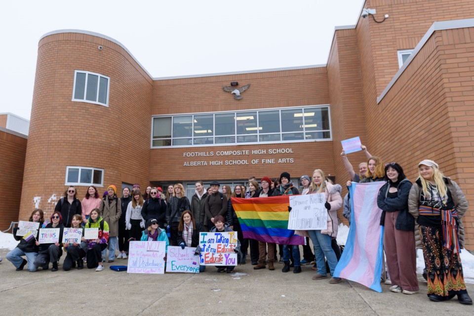 Students held a walkout at the Foothills Composite High School in Okotoks to protest new policies about gender and sexuality on Feb. 7.