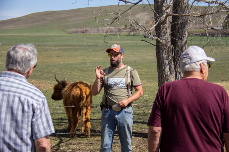 Nick Shipley leads a tour of Hartell Homestead during the third anniversary celebration on May 11.