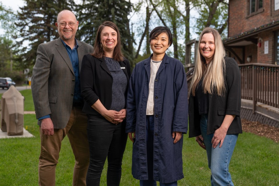 Okotoks Culture and Heritage team lead Allan Boss (left), Coun. Rachel Swendseid, 2024 Sheep River Artist in Residence Wanru Kemp and 2023 Sheep River Artist in Residence Tanya Zakarow. 