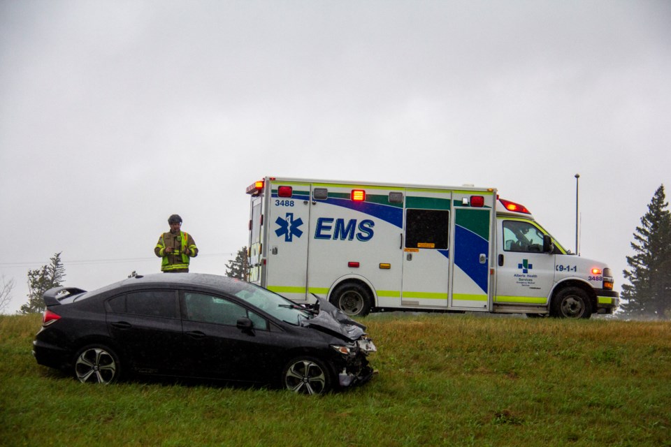 Emergency crews are at a single-vehicle accident on Highway 2 approaching the Okotoks overpass.