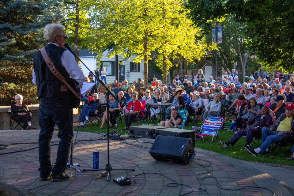 Concertgoers packed Olde Towne Plaza in Okotoks for the final Thursday Nights @ the Plaza show, featuring Calgary-based quartet Silence in B'tween, on Aug. 29. Pictured is  lead vocalist and guitarist John Hodgson.