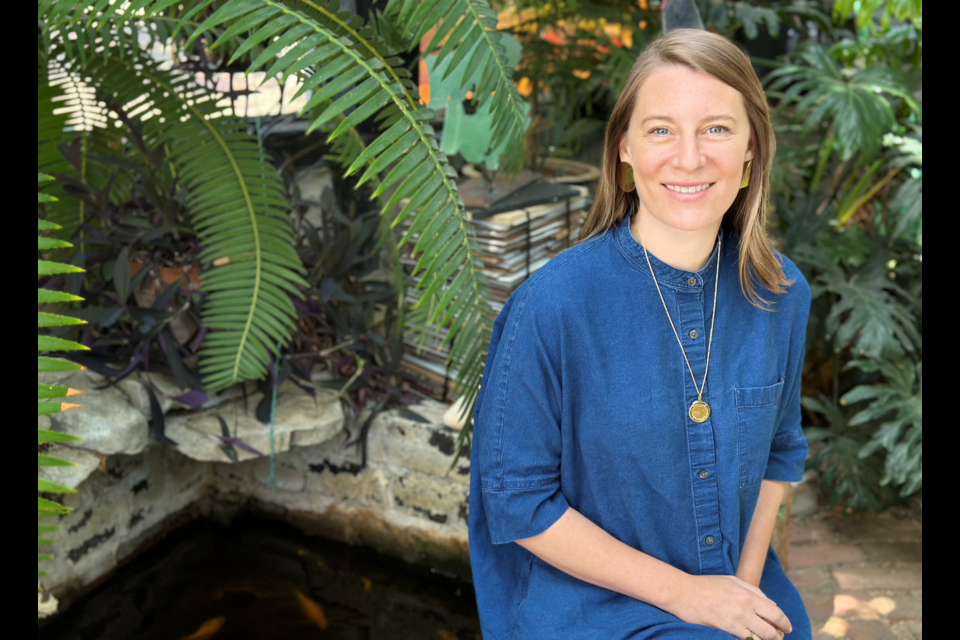 Christina Cuthbertson, executive director of the Leighton Art Centre since 2021, poses in the gallery's botanical garden.