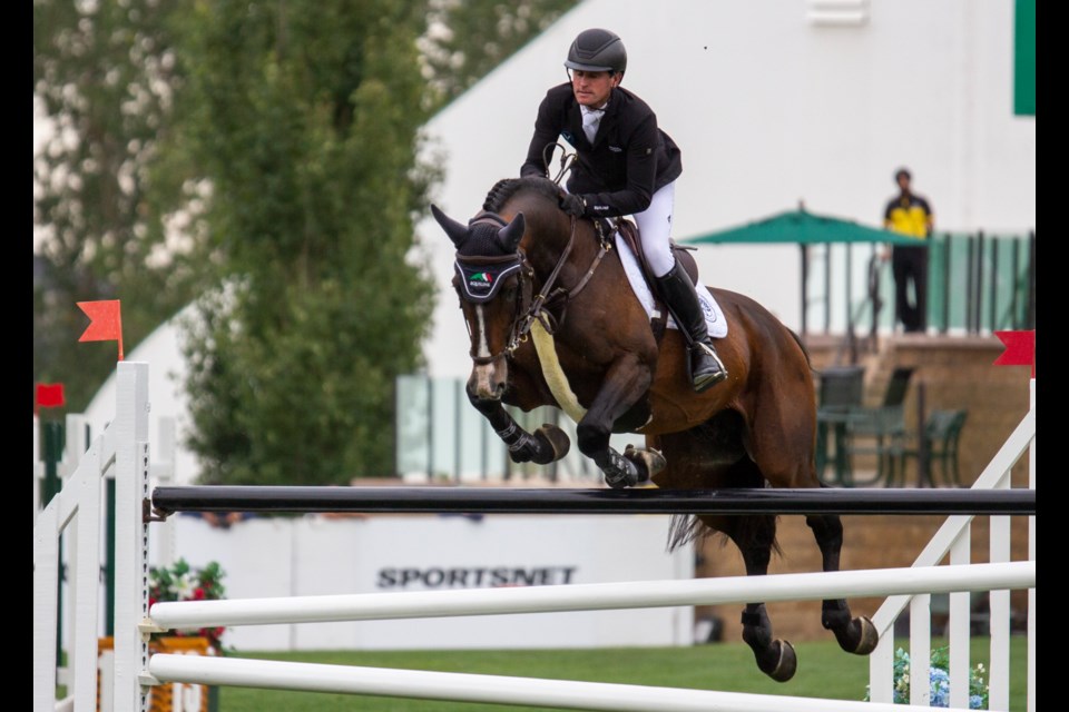 Ireland's Darragh Kenny clears a round — adding another $490 contribution to the "Jump for Jasper" campaign — atop Hamrah Van Het Exelhof Z on Sept. 4 at the Spruce Meadows 'Masters' international showjumping competition.