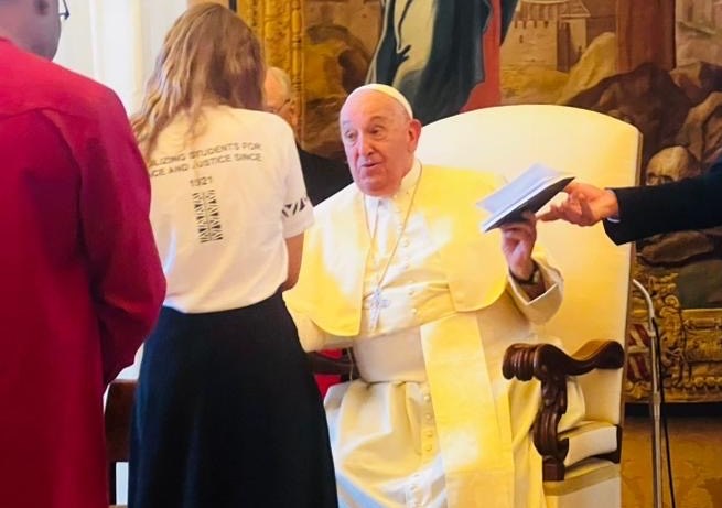 Mackenzie Neufeld brought her book 'From Physics to Faith' to Rome and gifted it to Pope Francis in the Vatican on Sept. 20.