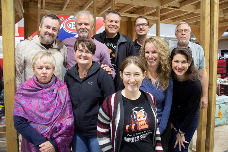 Director Katie Fournell (front) poses with the cast of the Dewdney Players' upcoming production of 'Noises Off' during rehearsals on Oct. 17.