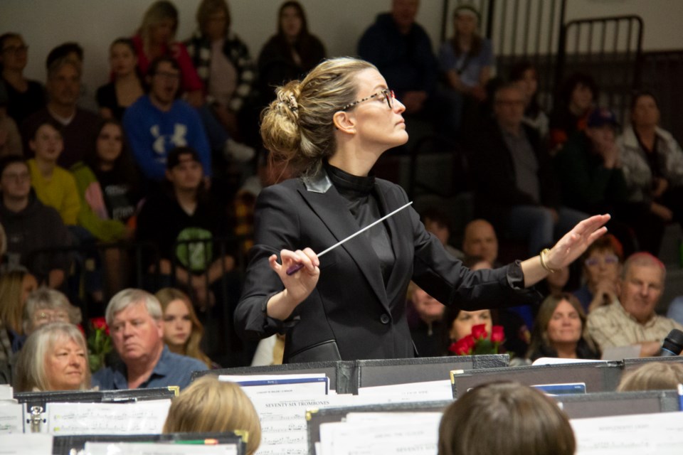 Music teacher Emma Ashcroft conducts during the the Alberta High School of Fine Arts concert band performance at the school's third annual Sweet Showcase on Oct. 24.