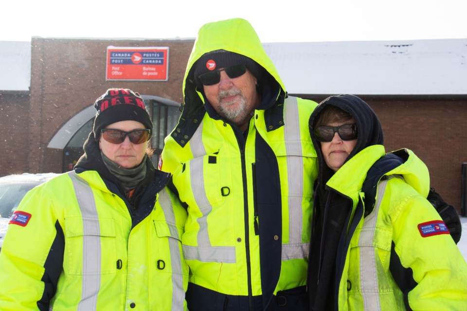 Members of Canadian Union of Postal Workers (CUPW) Local 710, pictured on Nov. 21, have been striking on McRae Street, across from the Canada Post office, for nearly a week.