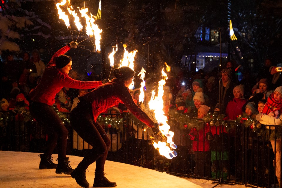 Indigo Circus fire dancers lit up the McArthur Stage during Light Up Okotoks 2024 on Nov. 22.