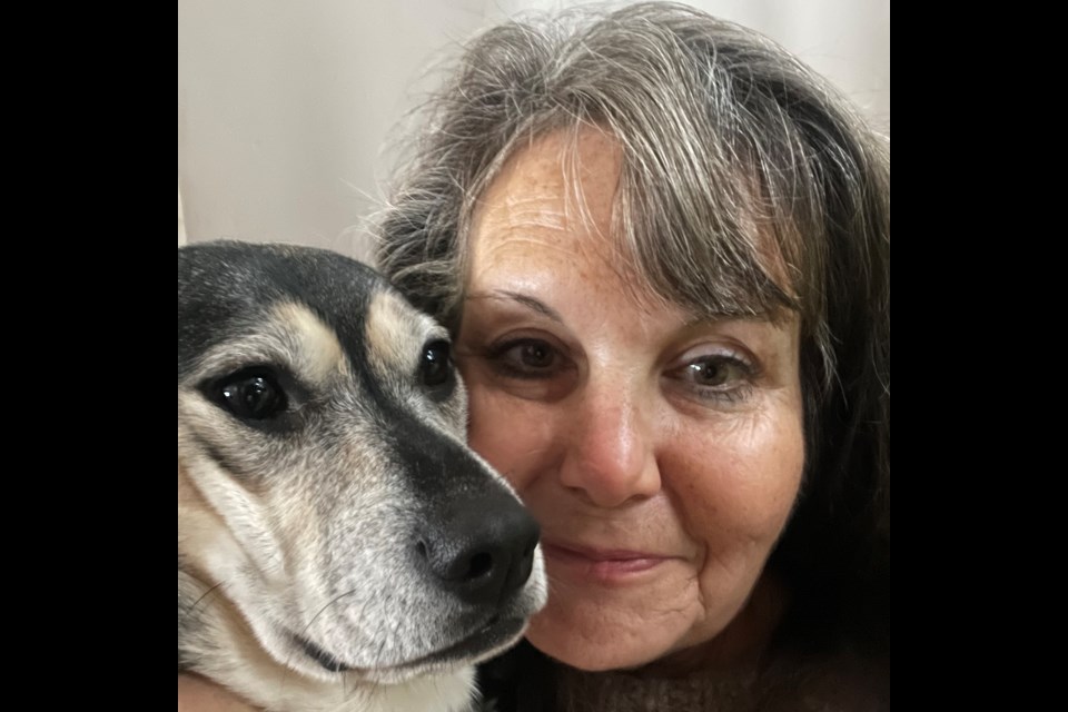 Fiona Haynes is shown with Rosie, a Pound Rescue dog she inherited after a good friend passed away three years ago.  