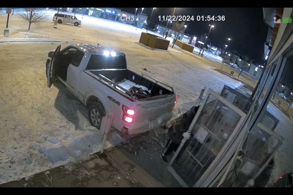 Multiple security cameras captured a burglary at Maco Liquor in Okotoks on Nov. 22.