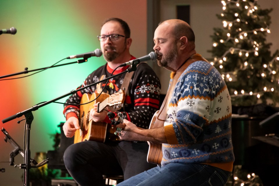 Musical duo 33 Union, composed of Mike Martel (left) and Shaun Cardinal, captivate the crowd during the 18th annual Okotoks Food Bank Christmas Concert on Dec. 10 at the Okotoks Evangelical Free Church.