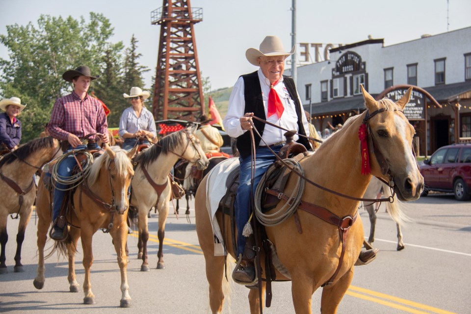 Parade marshal John Scott is all smiles during the Little New York Daze parade in Longview on July 20.