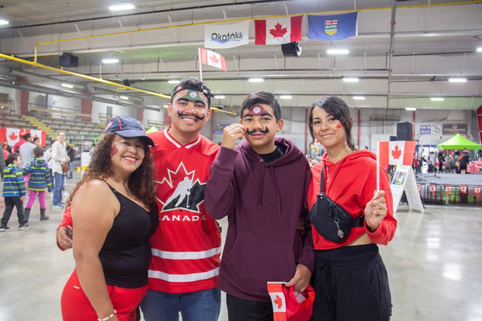 Community members take part in the Canada Day celebration on July 1 in the Okotoks Recreation Centre's Murray Arena. 
