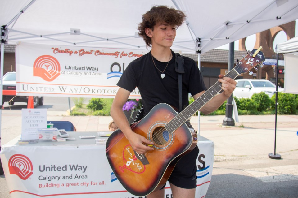 Dave Grunleitner performs while promoting the upcoming 'Okotoks' Got Talent!' charity event during Taste of Okotoks on July 20.