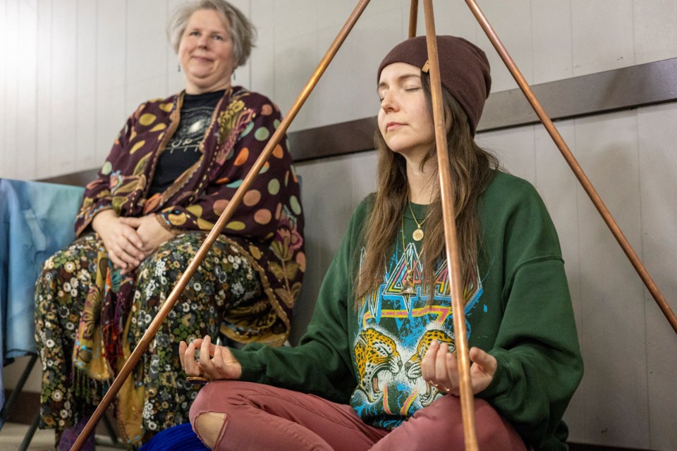 Ashlee Welz works with energies during 'Journey of the Third Eye' at Okotoks Elks Hall on Jan. 11.