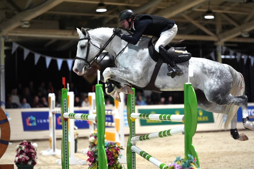 Austin Krawitt of Okotoks wins the 1.35m Birchcliff Energy Sunday, Oct. 6 at Spruce Meadows in Foothills County. (Spruce Meadows Media/Bart Onyszko)