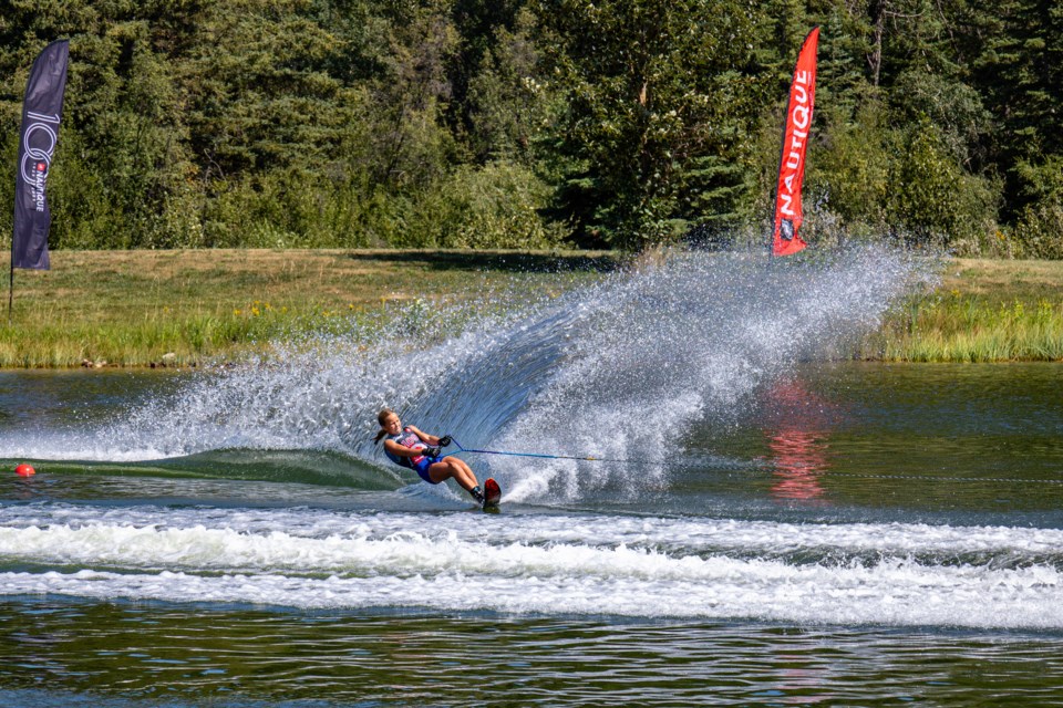 Sofia Pelkey from the Bragg Creek area showcases her water skiing abilities in slalom at the 2024 IWWF World Under 17 Waterski Championships at the Predator Bay Water Ski Club in Foothills County on Aug. 1. 