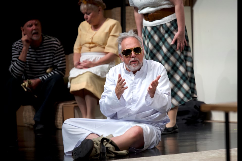 Frederick Fellowes, played by Joel Weder, pesters director Lloyd Dallas, played by Brad Snowden, with incessant questions during Dewdney Players' performance of 'Noises Off' on Nov. 2 at the Evan Hazell Theatre at the Seton YMCA in Calgary. 