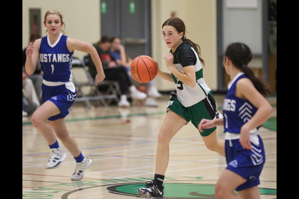 The Holy Trinity Knights take on the Highwood Mustangs during the 2022-23 season. (Brent Calver/Western Wheel File Photo)