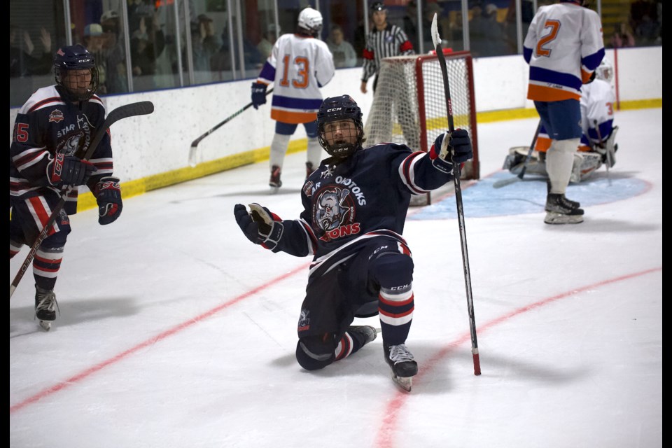 Carstar Okotoks Bisons forward Brandon Jarman celebrates his second period goal during the Heritage Junior Hockey League regular season opener versus the High River Flyers on Sept. 20 at the Murray Arena. Okotoks won by a 5-3 score. 