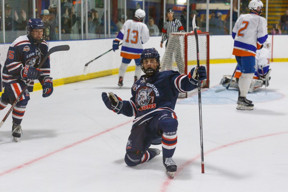 Carstar Okotoks Bisons forward Brandon Jarman celebrates his second period goal during the Heritage Junior Hockey League regular season opener versus the High River Flyers on Sept. 20 at the Murray Arena. Okotoks won by a 5-3 score. 