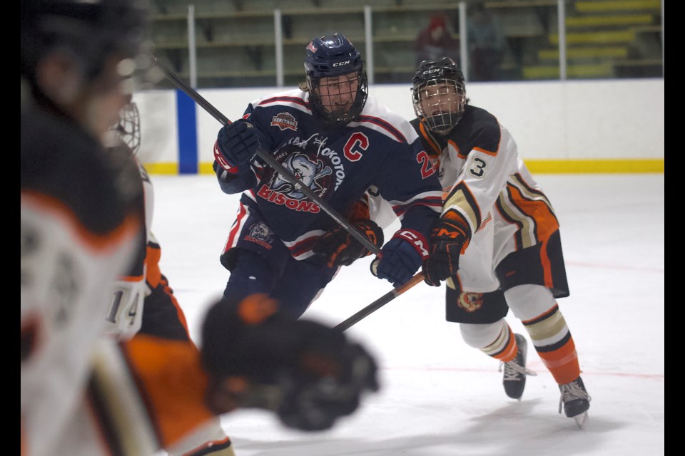 Carstar Okotoks Bisons captain Jake Snashall gets in on the forecheck during the team’s 4-3 win over the Coaldale Copperheads on Dec. 13 at the Murray Arena. 