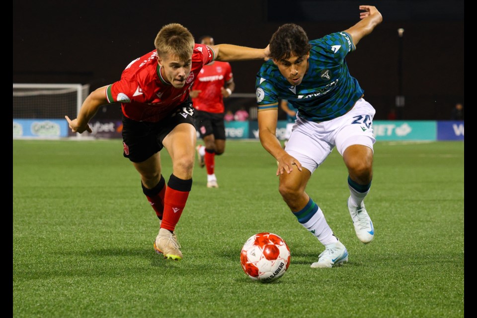 Cavalry FC right back Michael Harms battles with York United FC’s Jorge Guzmán during the Sept. 20 Canadian Premier League clash in Ontario. Cavalry won by a 2-0 score.