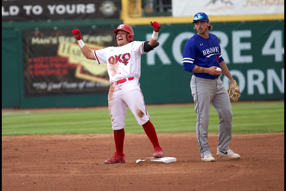 Okotoks Dawgs infielder Ricky Sanchez celebrates a leadoff double in the bottom of the first inning of the 11-6 win over the Brooks Bombers in WCBL action on June 1 at Seaman Stadium.