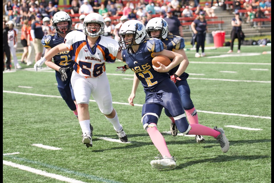 The Foothills Eagles held off the Calgary Wildcats 31-18 to win the U19 Southern Alberta Female Football League title on June 2 at Shouldice Park.