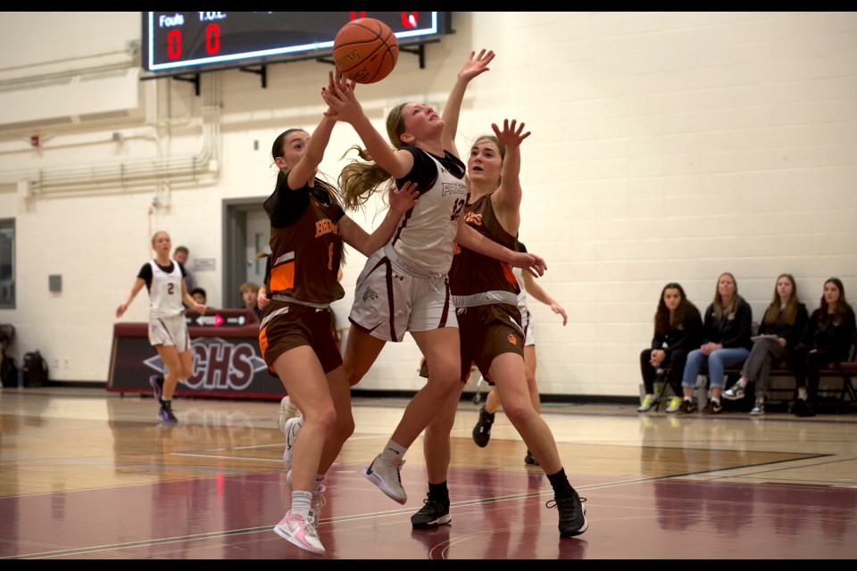 Foothills Falcons forward Zya Kerrison cuts to the basket during the team's opening win over the St. Francis Browns at the Sheep River Shoot-Out tournament on Jan. 10 in Okotoks. 