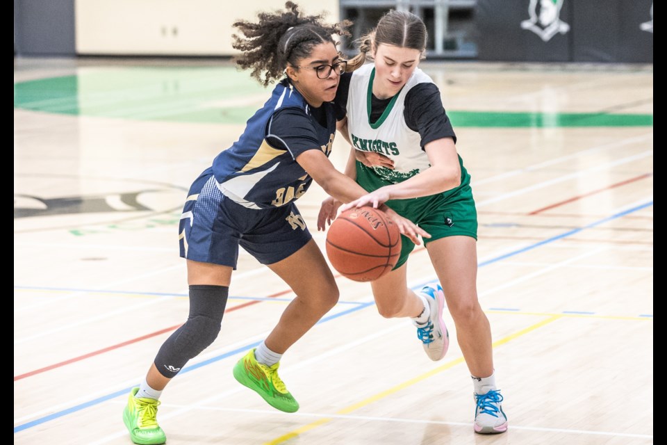 Holy Trinity Knight Kateri Krueger battles against the Notre Dame Pride defence during in the Knights Classic final at HTA last December. This year’s tournament runs Nov. 28-30.